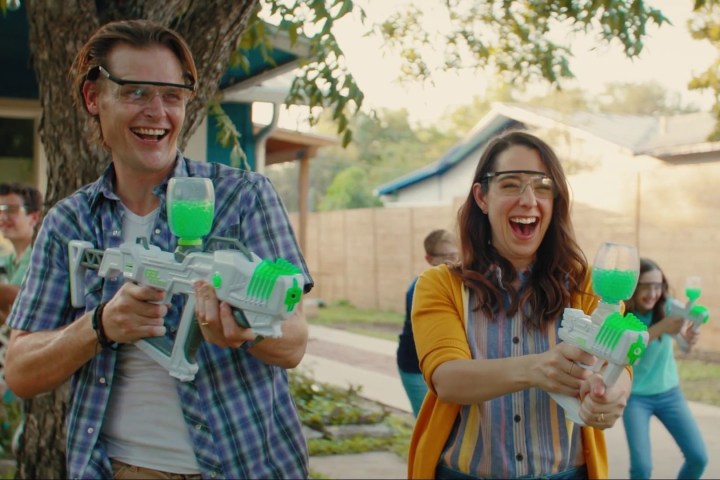 Adults playing Gel Blasters