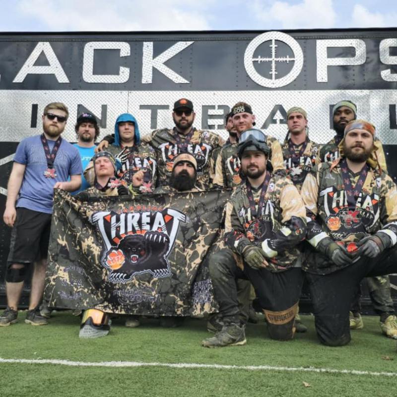 a group of people posing for the camera