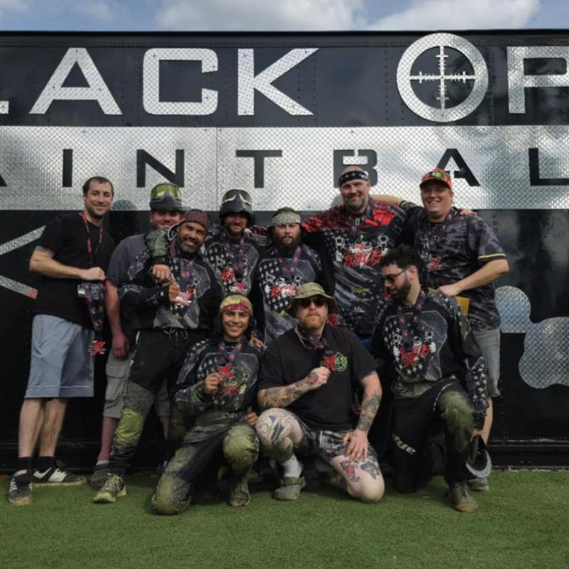 a group of football players posing for a picture