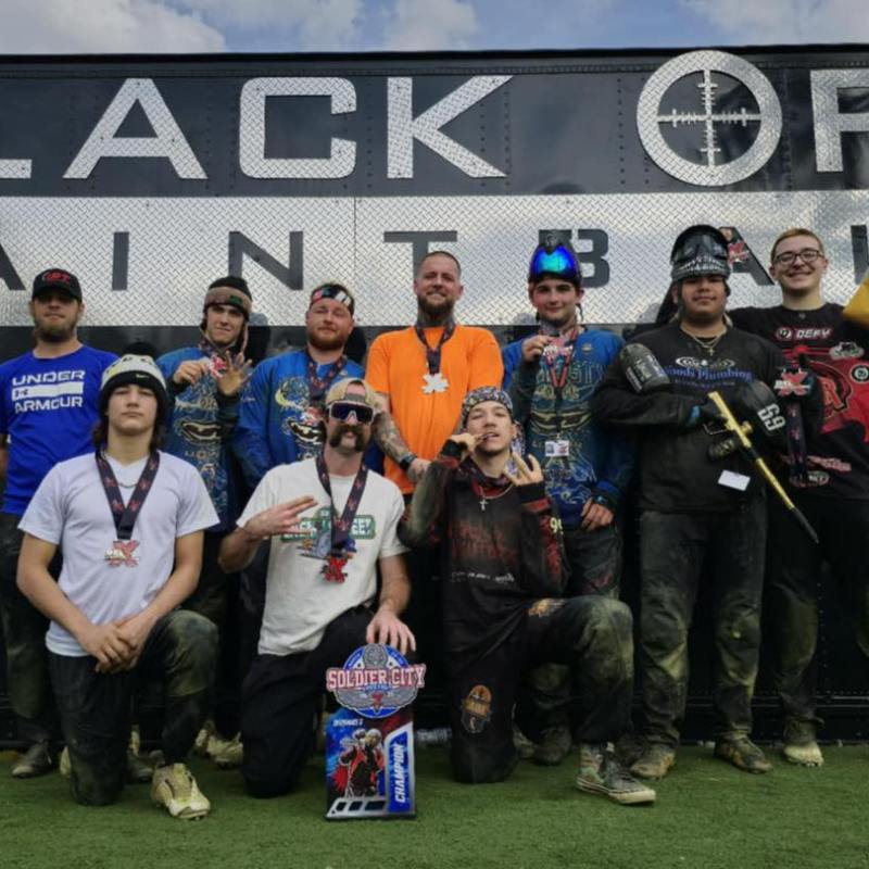 a group of people posing for the camera